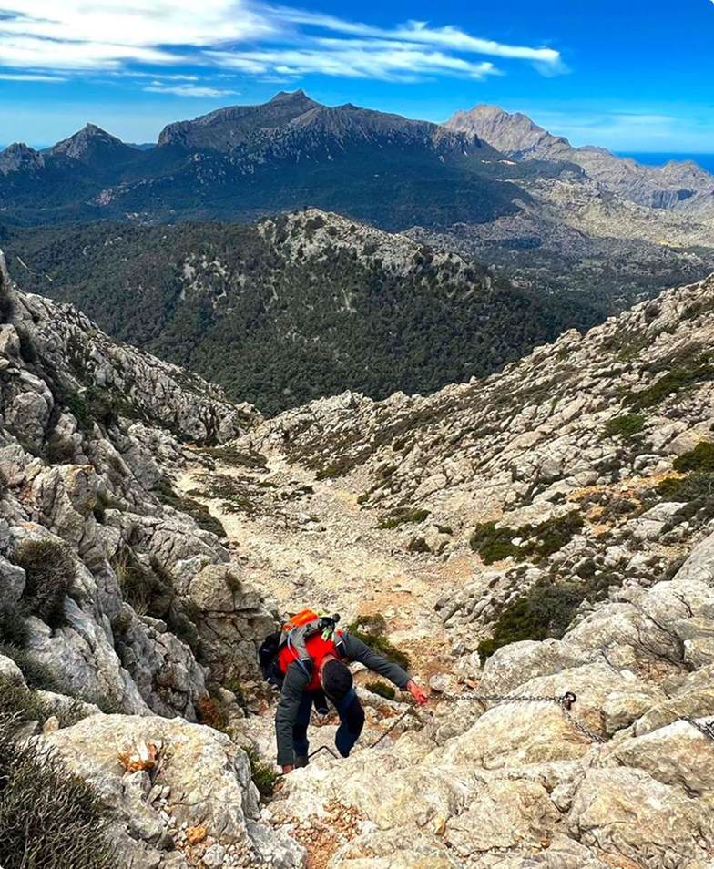 Hiker on challenging Serra de Tramuntana, Mallorca.