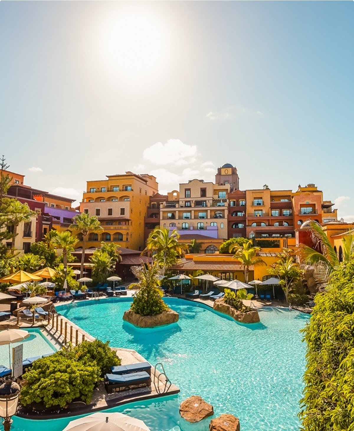 Tenerife resort pool and surrounding buildings.