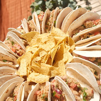 Pulled chicken tacos & tortilla chips platter.